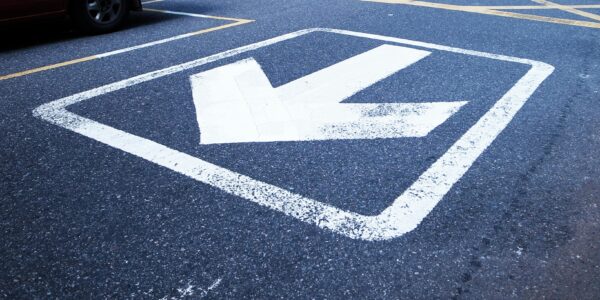 Photo by Tung Lam: https://www.pexels.com/photo/white-road-arrow-sign-117025/