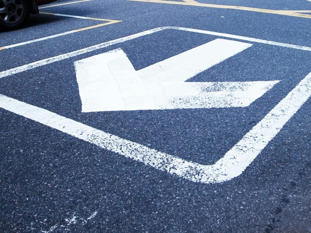 Photo by Tung Lam: https://www.pexels.com/photo/white-road-arrow-sign-117025/